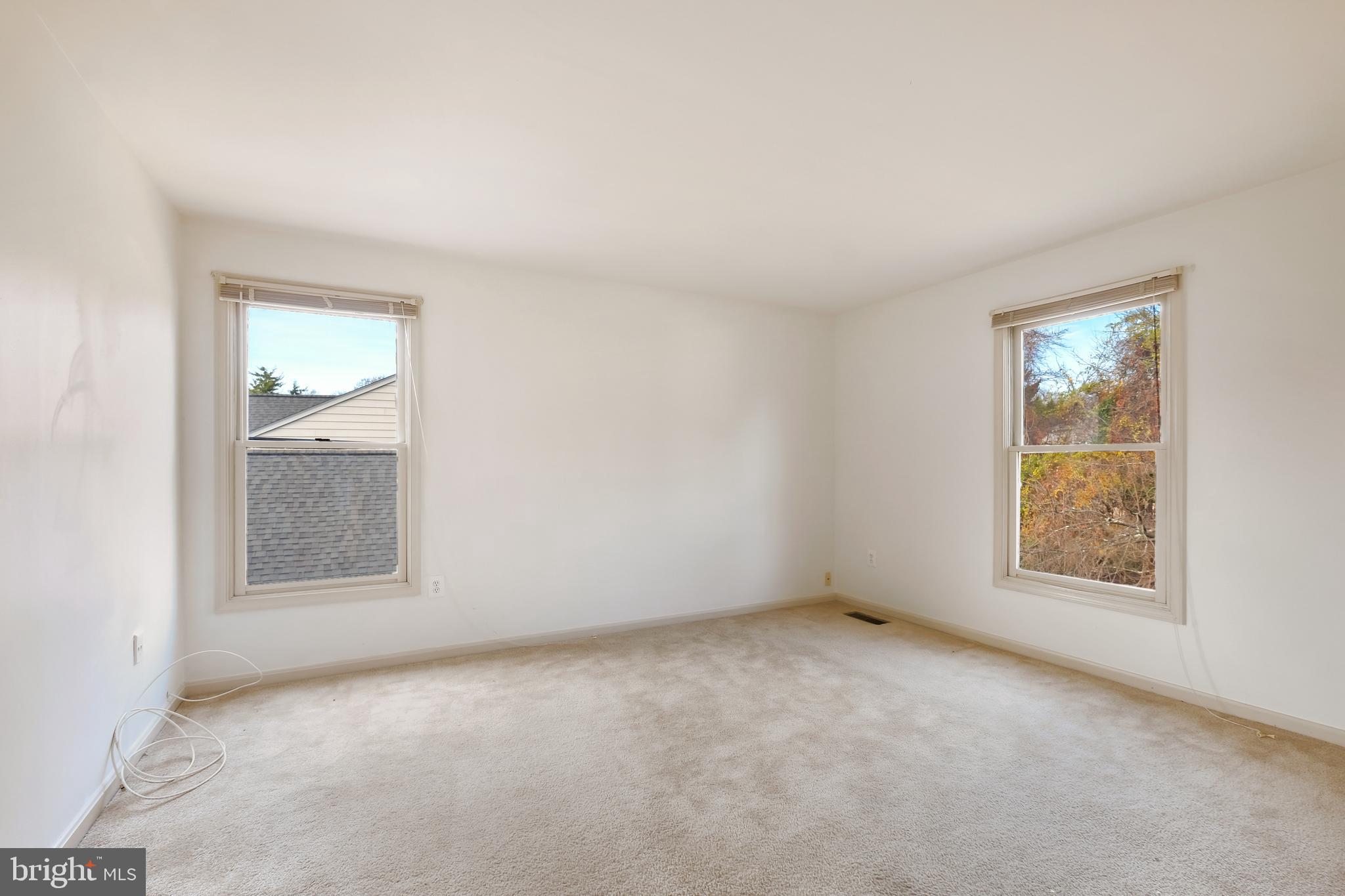 13905 Huxley Cove Court Silver Spring, MD 20906 - Photo 25 of 30 an empty room with windows