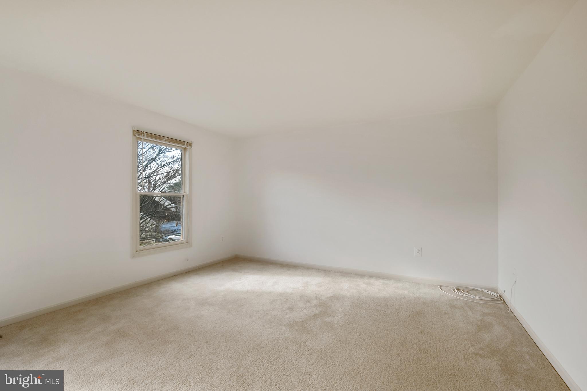 13905 Huxley Cove Court Silver Spring, MD 20906 - Photo 26 of 30 a view of an empty room with window