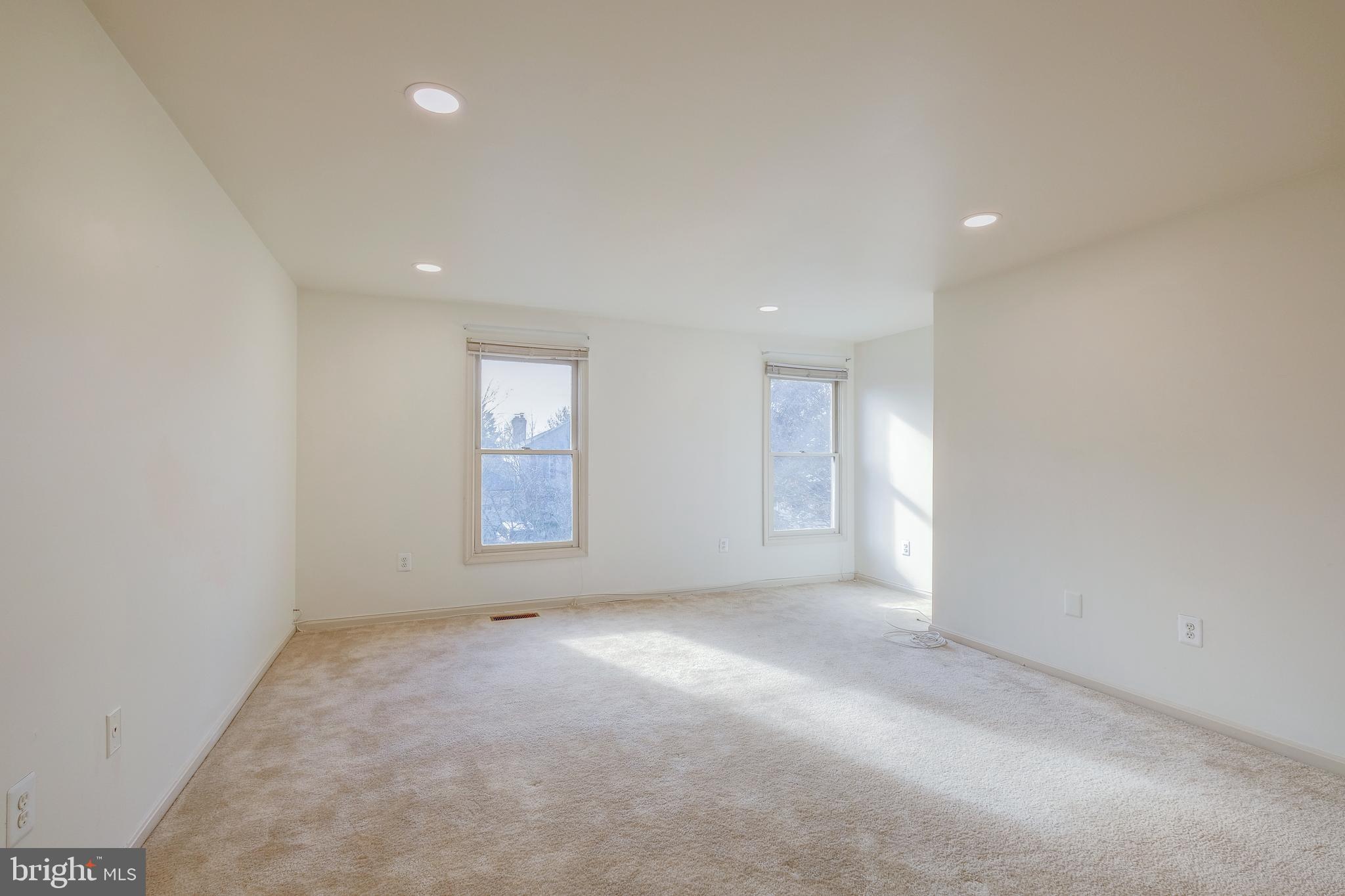 13905 Huxley Cove Court Silver Spring, MD 20906 - Photo 28 of 30 an empty room with windows
