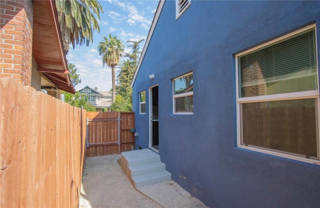 3110 Lime Street Riverside, CA 92501 - Photo 7 of 9 a view of a house with a backyard