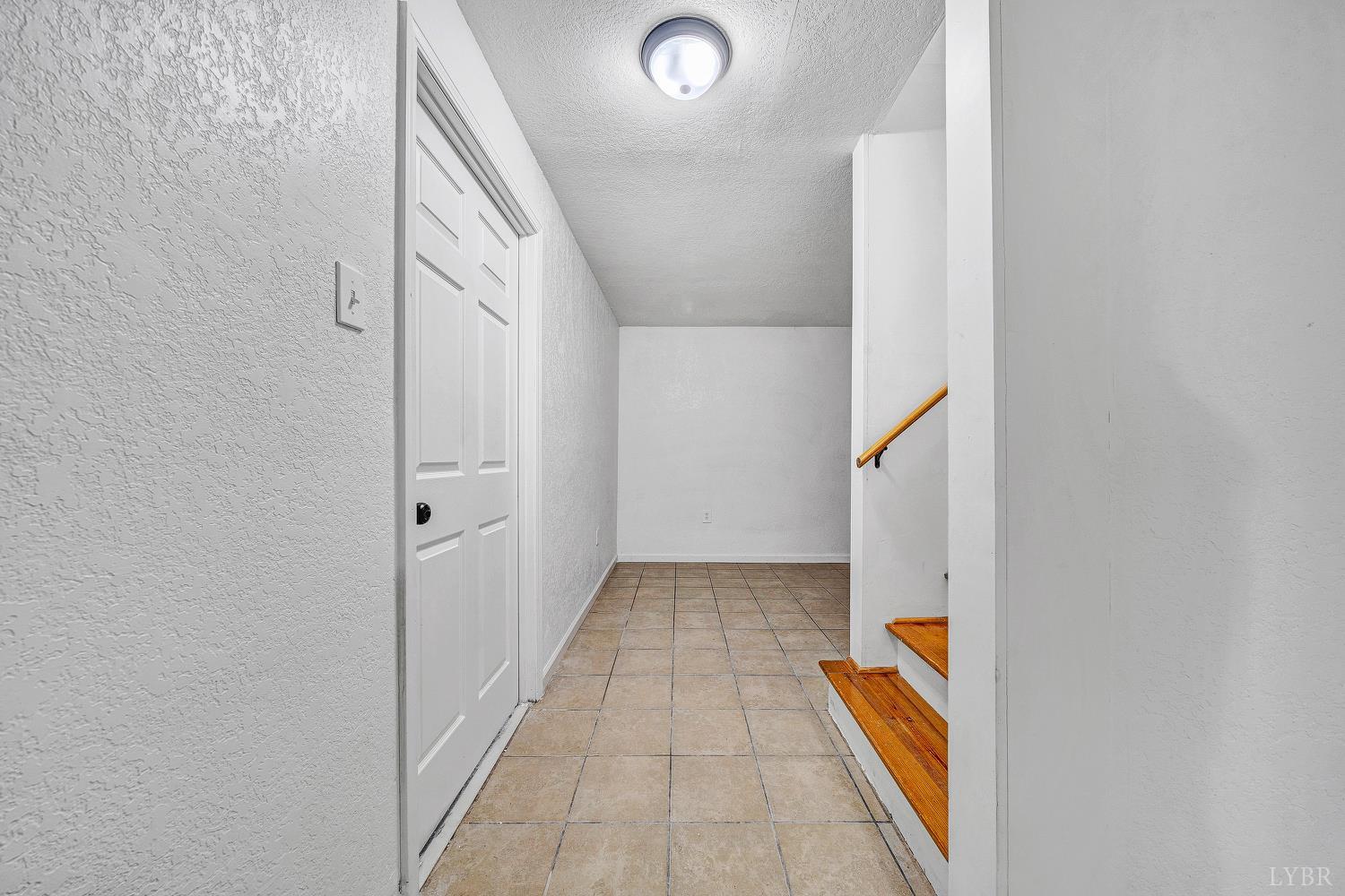3949 Diamond Hill Road Moneta, VA 24121 - Photo 17 of 30 a view of a hallway with wooden floor and entryway