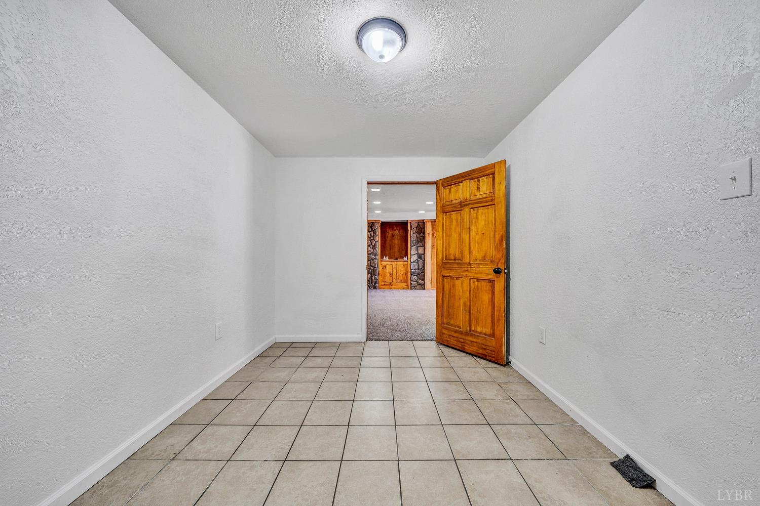 3949 Diamond Hill Road Moneta, VA 24121 - Photo 18 of 30 a view of an empty room and window