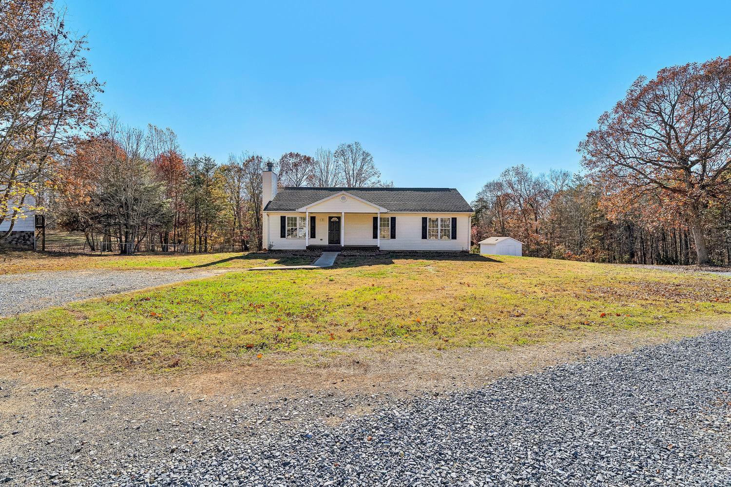 3949 Diamond Hill Road Moneta, VA 24121 - Photo 2 of 30 a view of a swimming pool with an ocean view