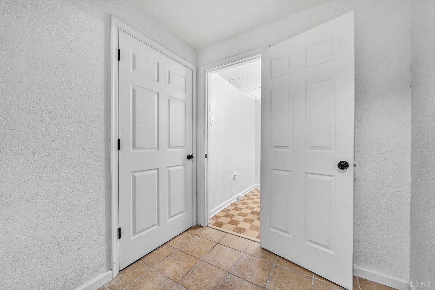 3949 Diamond Hill Road Moneta, VA 24121 - Photo 21 of 30 wooden floor with white walls