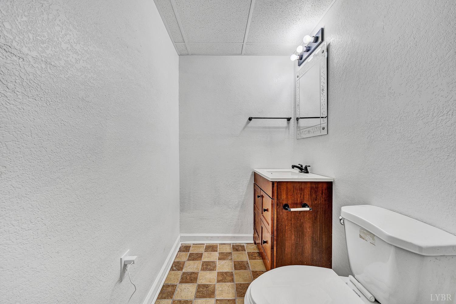 3949 Diamond Hill Road Moneta, VA 24121 - Photo 22 of 30 a bathroom with a toilet and a shower