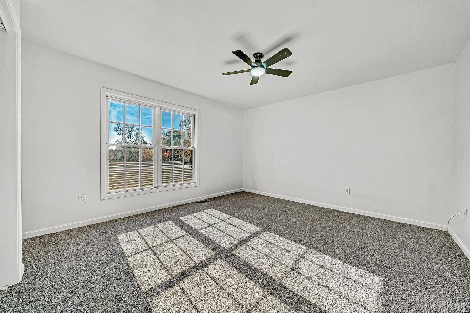 3949 Diamond Hill Road Moneta, VA 24121 - Photo 10 of 30 a view of an empty room and window