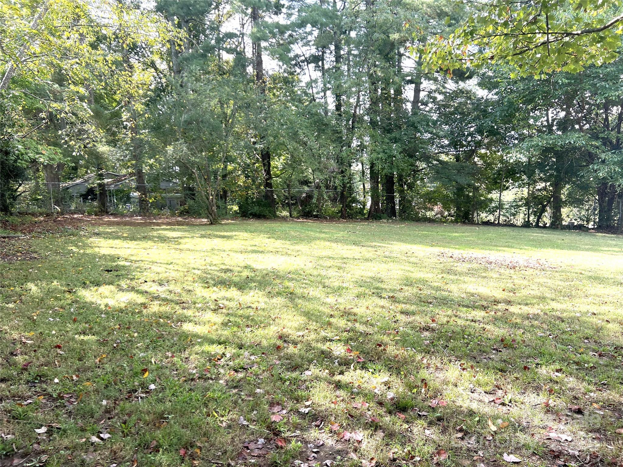 3674-l R Lr Walker Road Morganton, NC 28655 - Photo 12 of 21 a view of a field with an trees