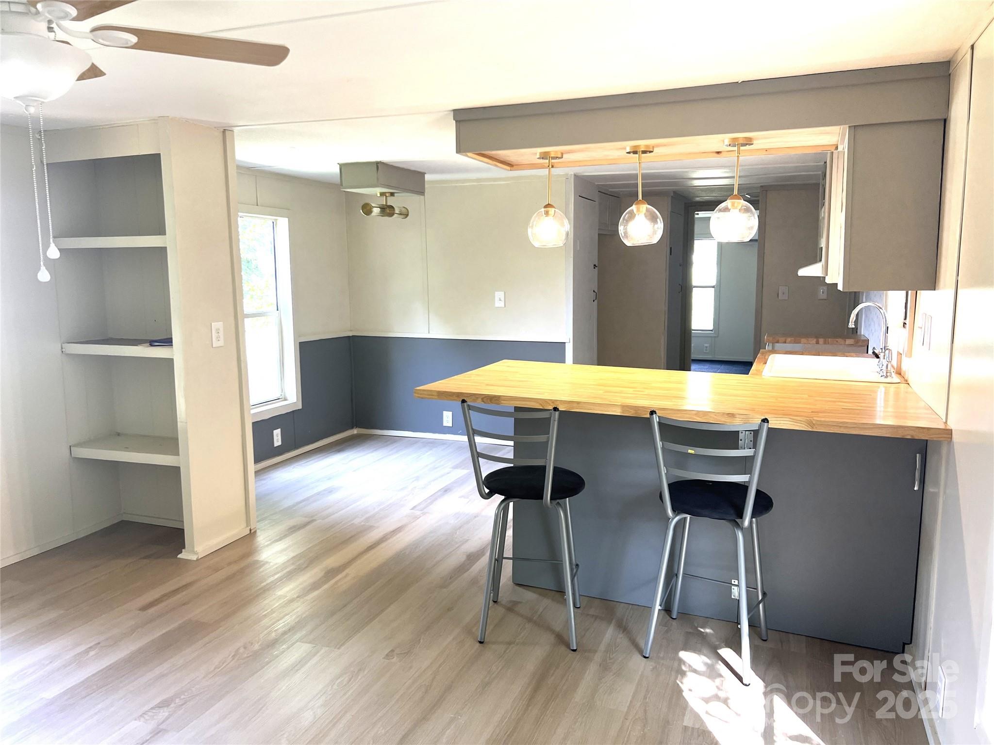 3674-l R Lr Walker Road Morganton, NC 28655 - Photo 3 of 21 a kitchen with a table and chairs in it