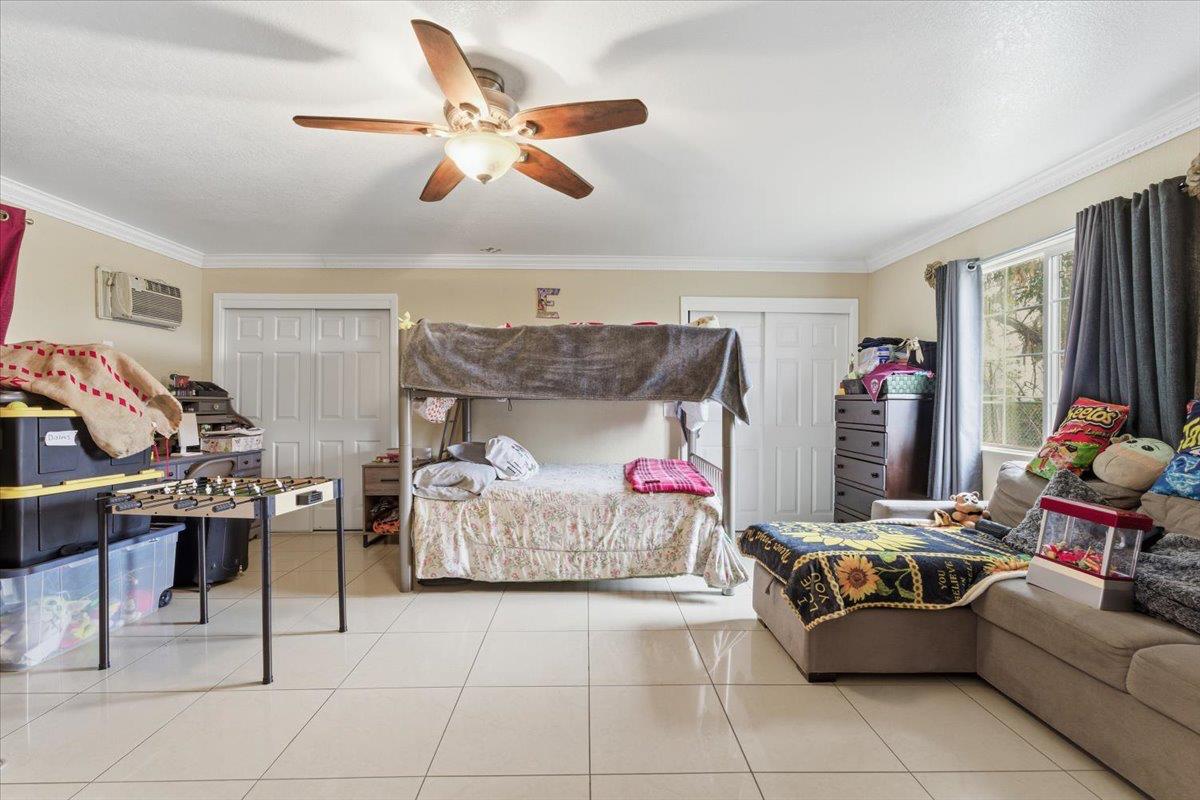 3902 Arch Road Stockton, CA 95215 - Photo 14 of 30 a living room with furniture and a couch