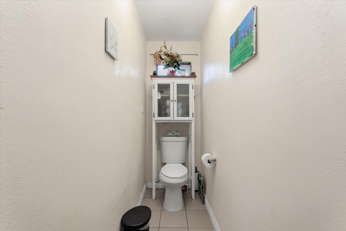 3902 Arch Road Stockton, CA 95215 - Photo 17 of 30 a bathroom with a toilet