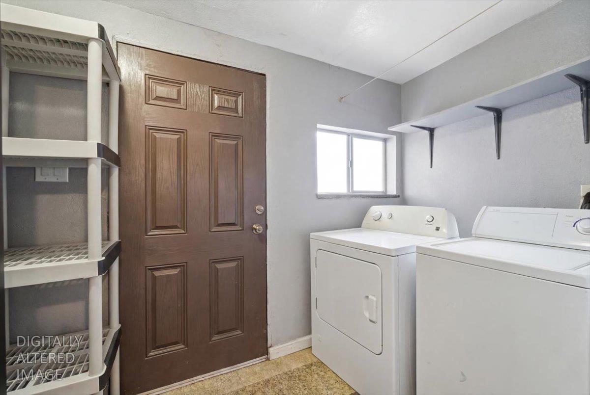 3902 Arch Road Stockton, CA 95215 - Photo 18 of 30 a view of storage and utility room with washer and dryer