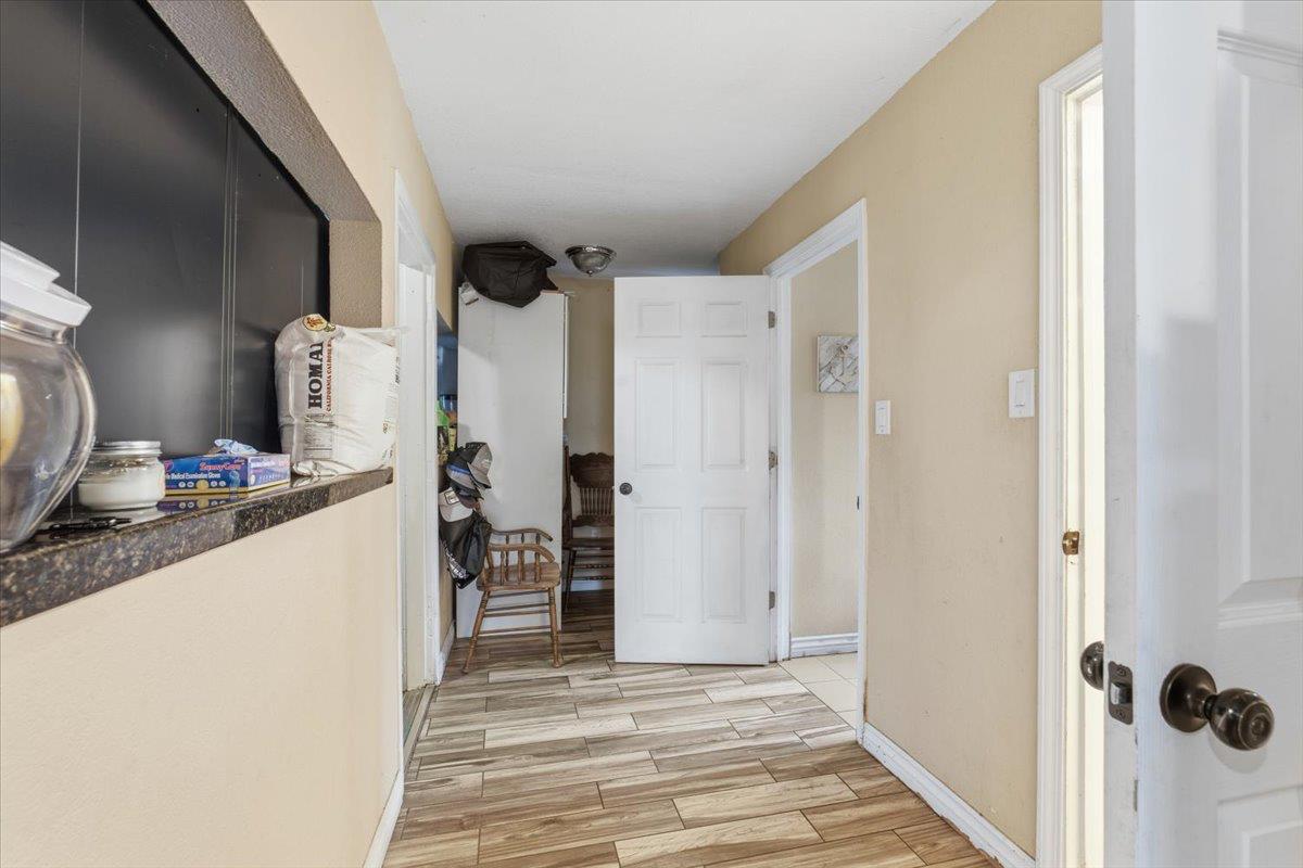 3902 Arch Road Stockton, CA 95215 - Photo 19 of 30 a view of a kitchen from the hallway