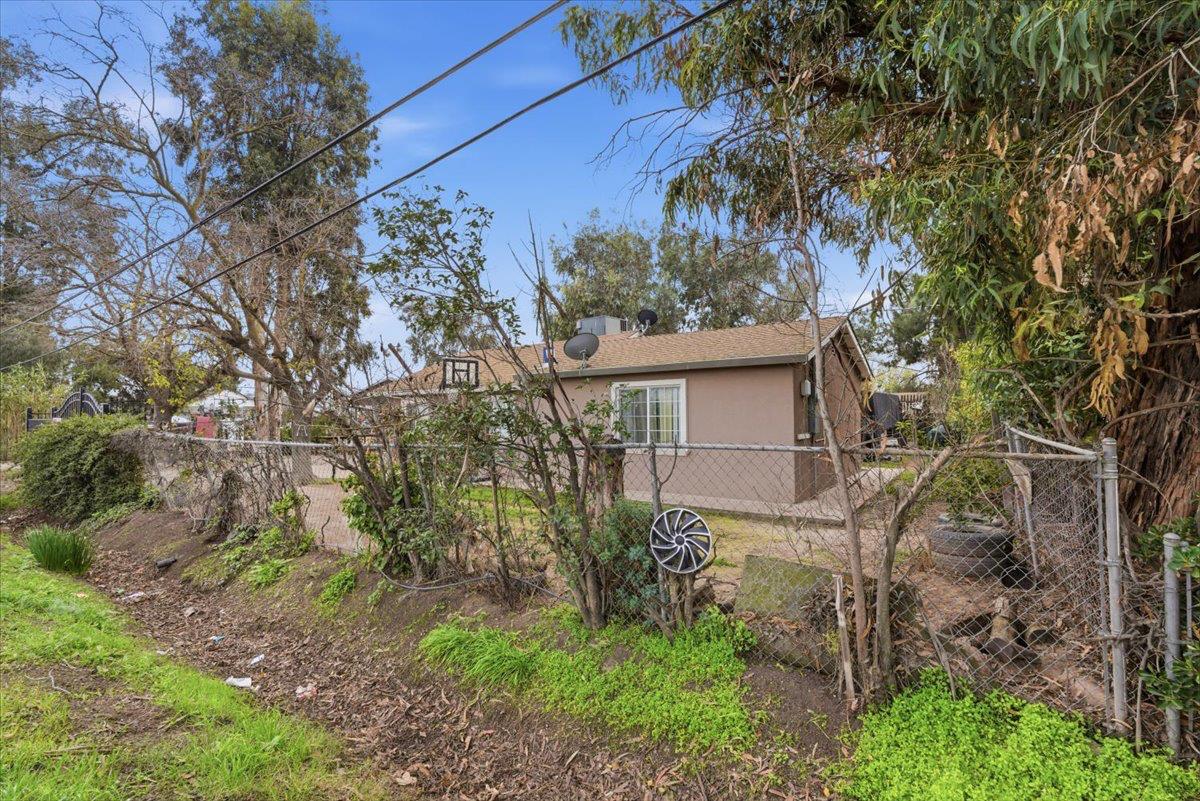 3902 Arch Road Stockton, CA 95215 - Photo 21 of 30 a view of a house with a tree