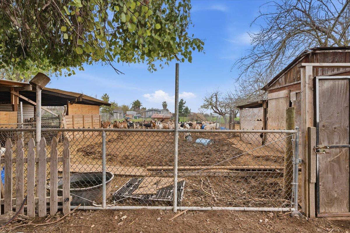 3902 Arch Road Stockton, CA 95215 - Photo 24 of 30 a house view with a tree and a yard