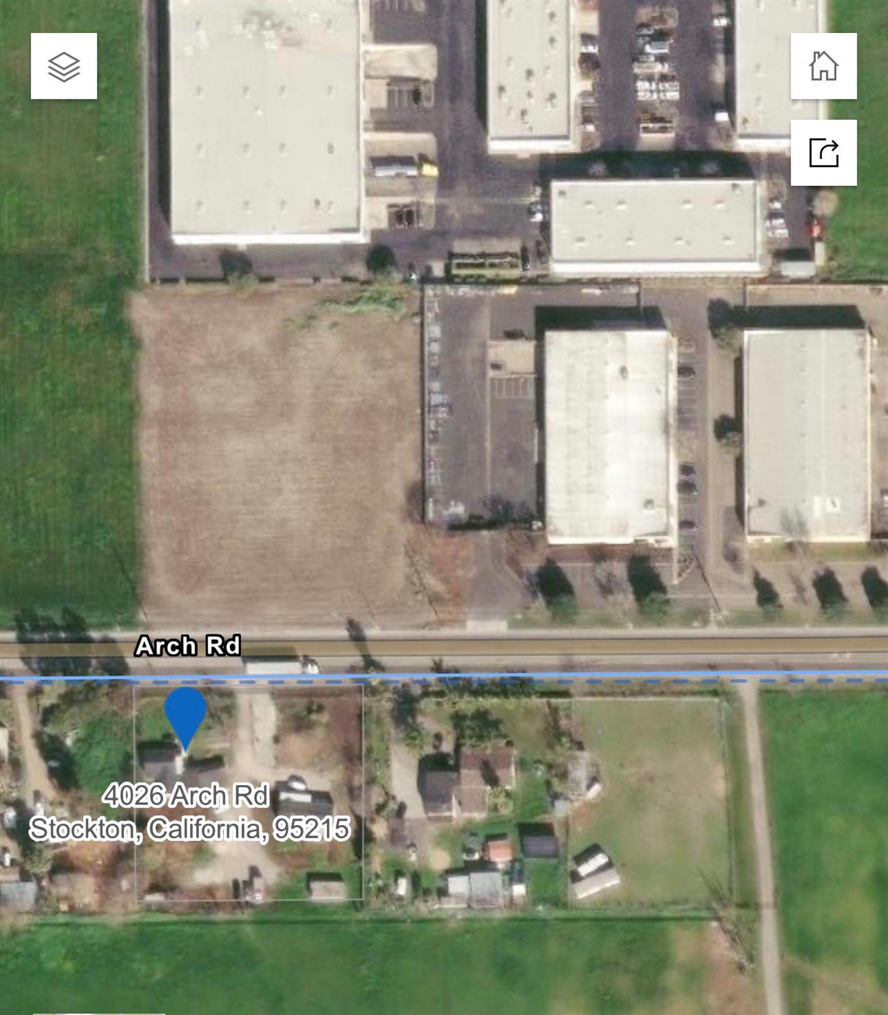 3902 Arch Road Stockton, CA 95215 - Photo 27 of 30 a close view of kitchen island with granite countertop lots of clutter