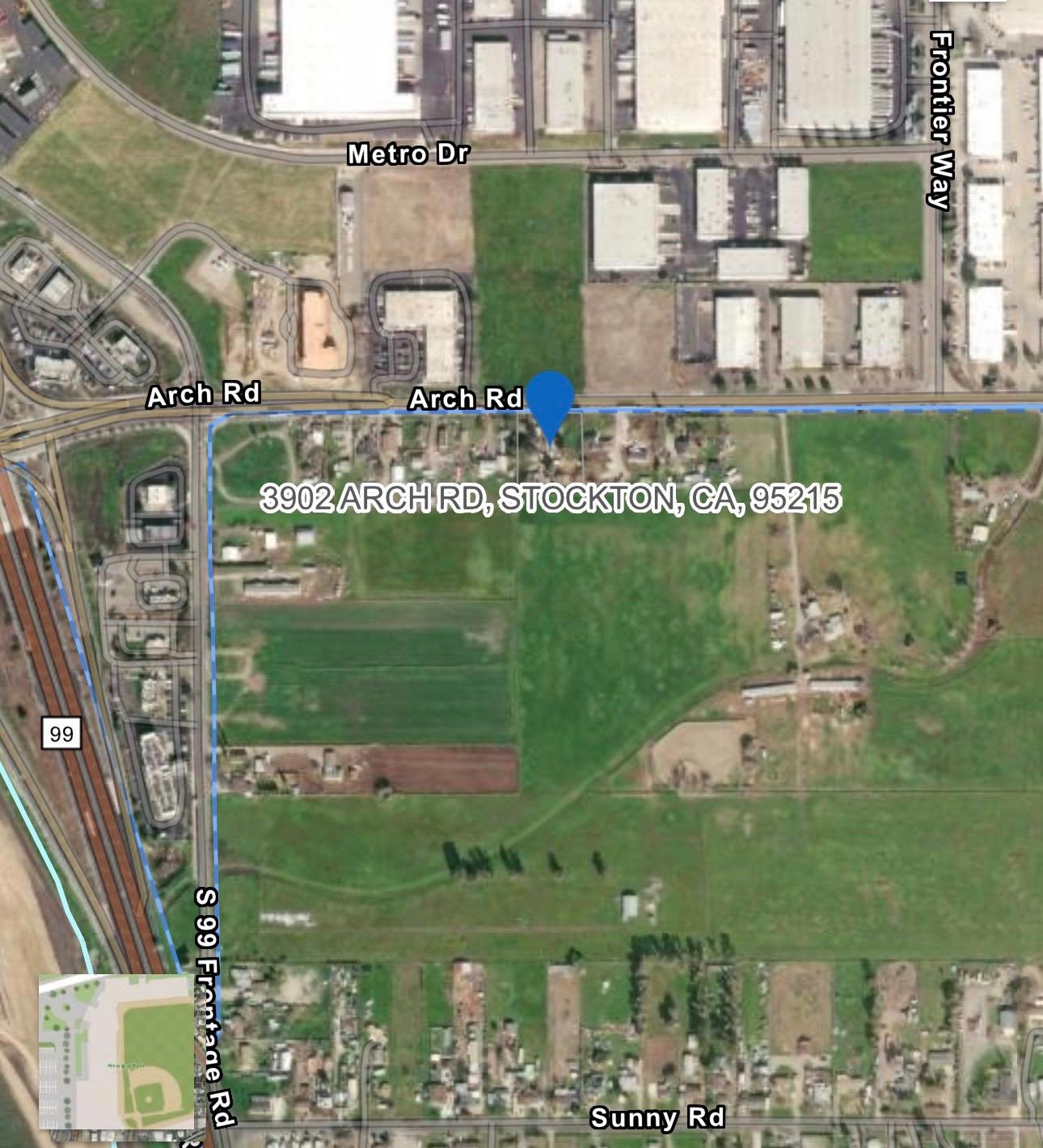 3902 Arch Road Stockton, CA 95215 - Photo 29 of 30 a large body of water with a building in the background