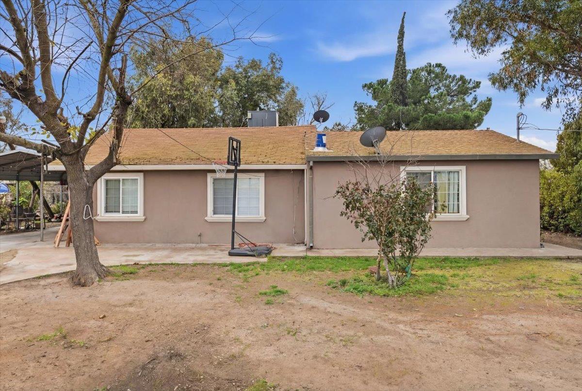 3902 Arch Road Stockton, CA 95215 - Photo 7 of 30 a front view of a house with garden