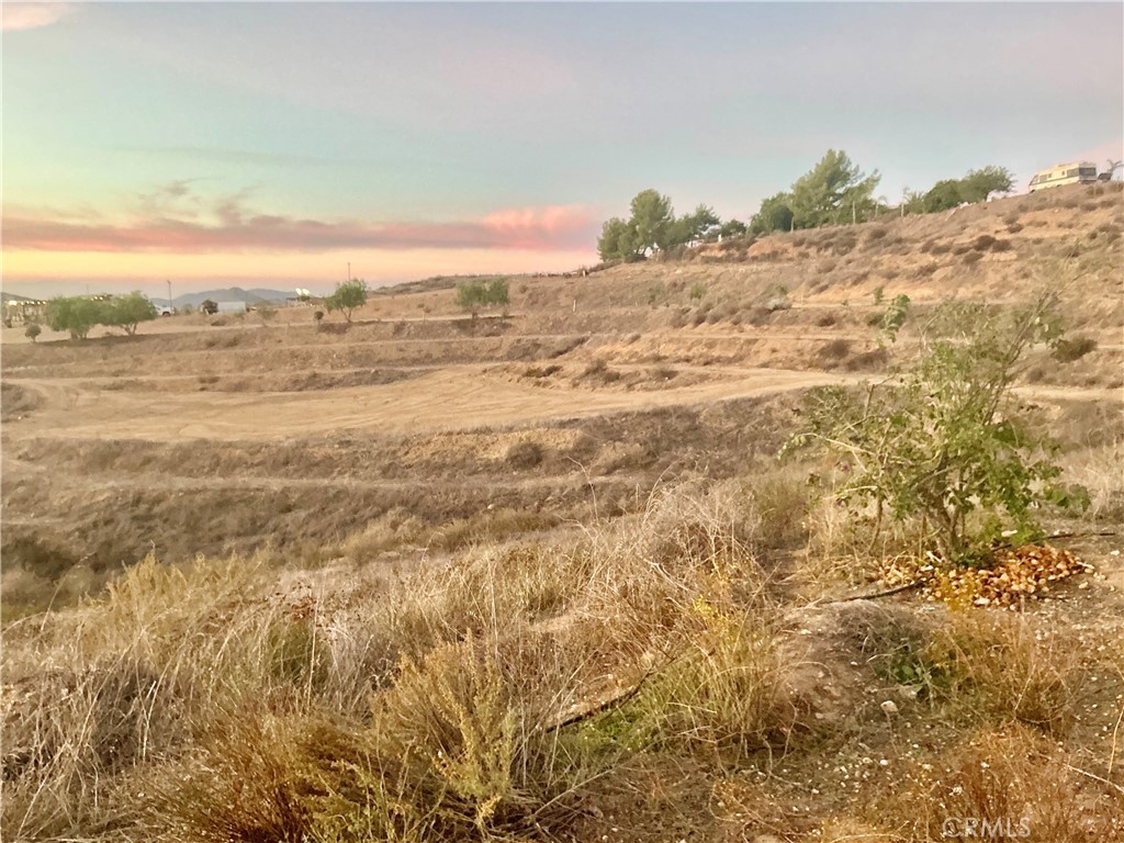41130 Voyager Road Hemet, CA 92544 - Photo 11 of 35 a view of a large body of water with a building in the background