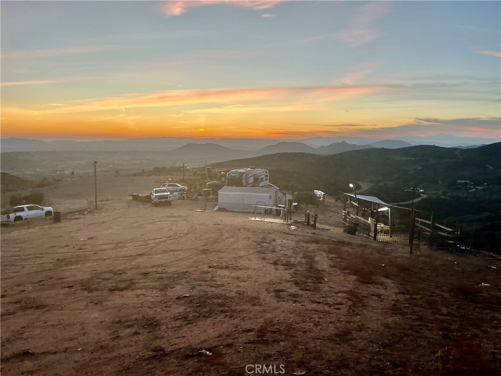 41130 Voyager Road Hemet, CA 92544 - Photo 6 of 35 a view of a lake with mountains in the background