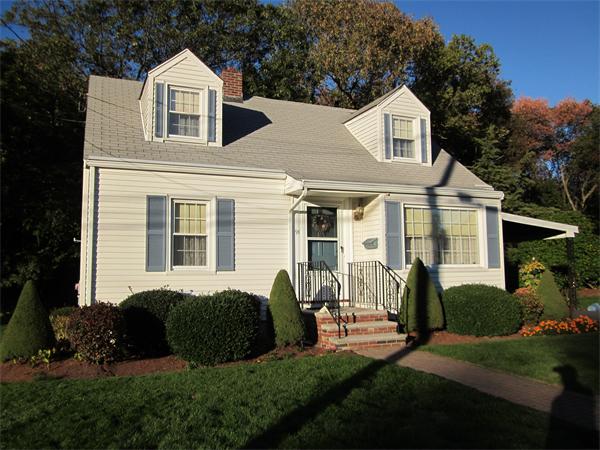 91 Sheffield Road Waltham, MA 02451 - Photo 1 of 1 a front view of a house with a garden and porch