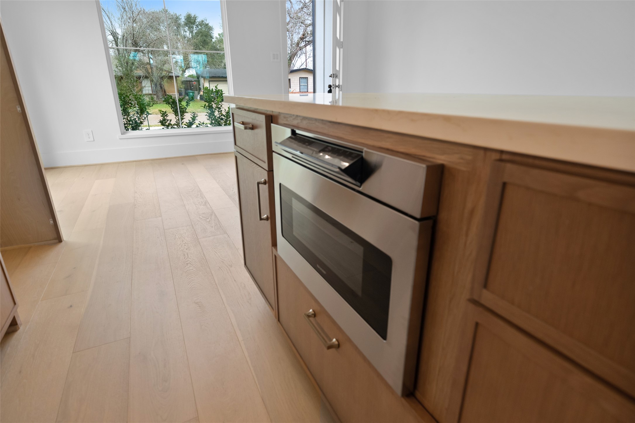 8521 Friendship Road Houston, TX 77080 - Photo 15 of 49 a kitchen with a stove and a microwave