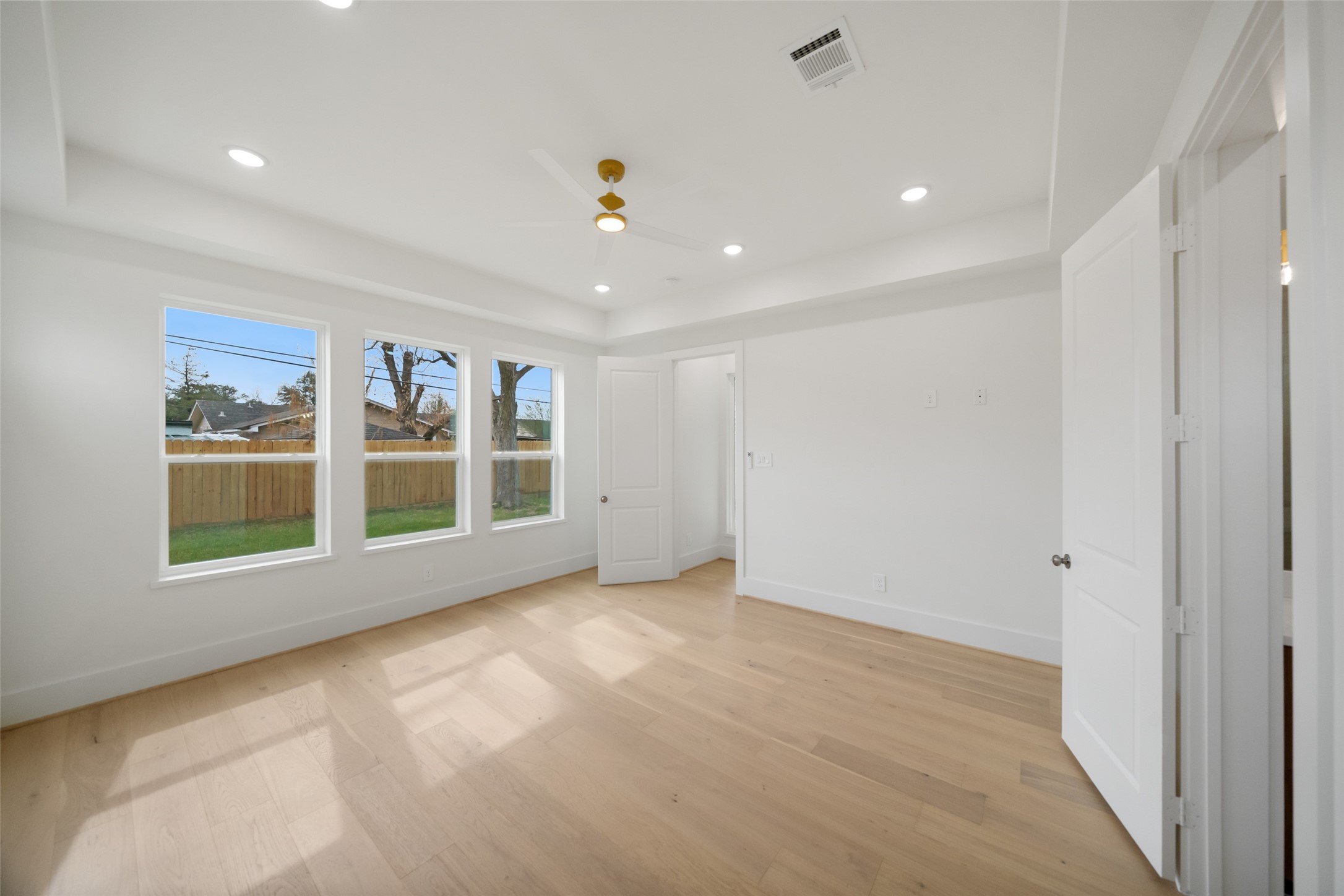 8521 Friendship Road Houston, TX 77080 - Photo 19 of 49 a view of an empty room with a window
