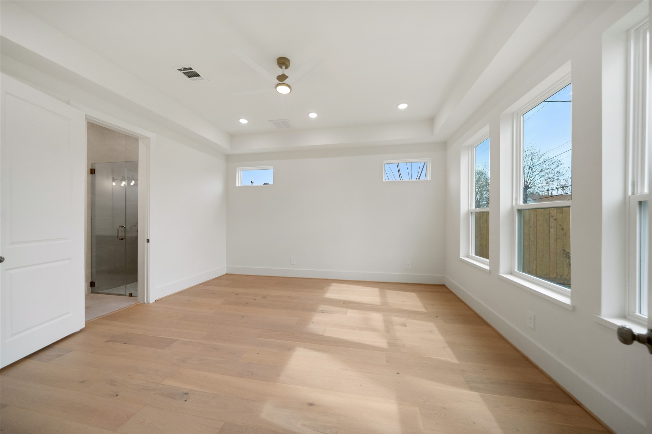 8521 Friendship Road Houston, TX 77080 - Photo 21 of 49 a view of an empty room with a window