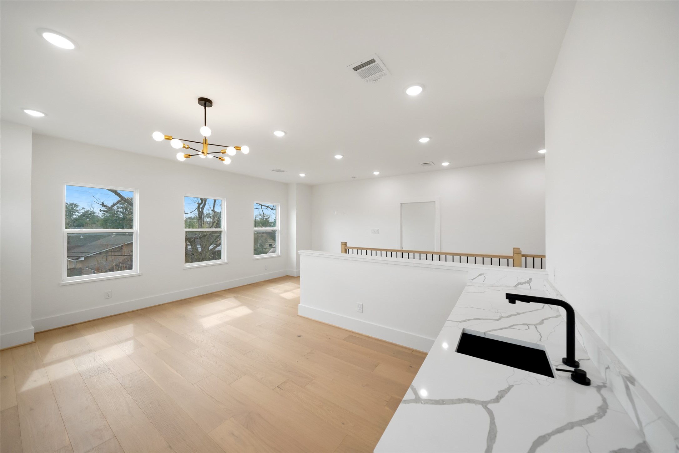 8521 Friendship Road Houston, TX 77080 - Photo 29 of 49 a view of a living room and kitchen