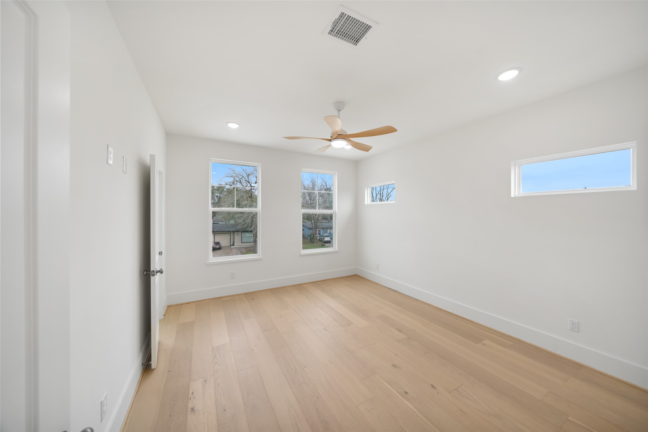 8521 Friendship Road Houston, TX 77080 - Photo 34 of 49 a view of livingroom with hardwood floor and window