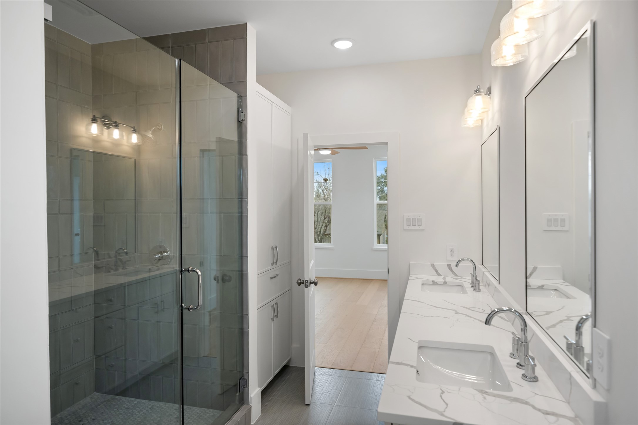 8521 Friendship Road Houston, TX 77080 - Photo 35 of 49 a bathroom with a bathtub and a shower