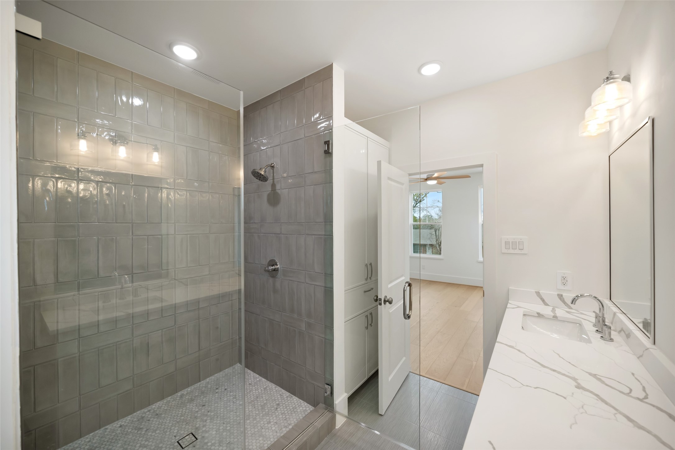 8521 Friendship Road Houston, TX 77080 - Photo 36 of 49 a bathroom with a sink and shower