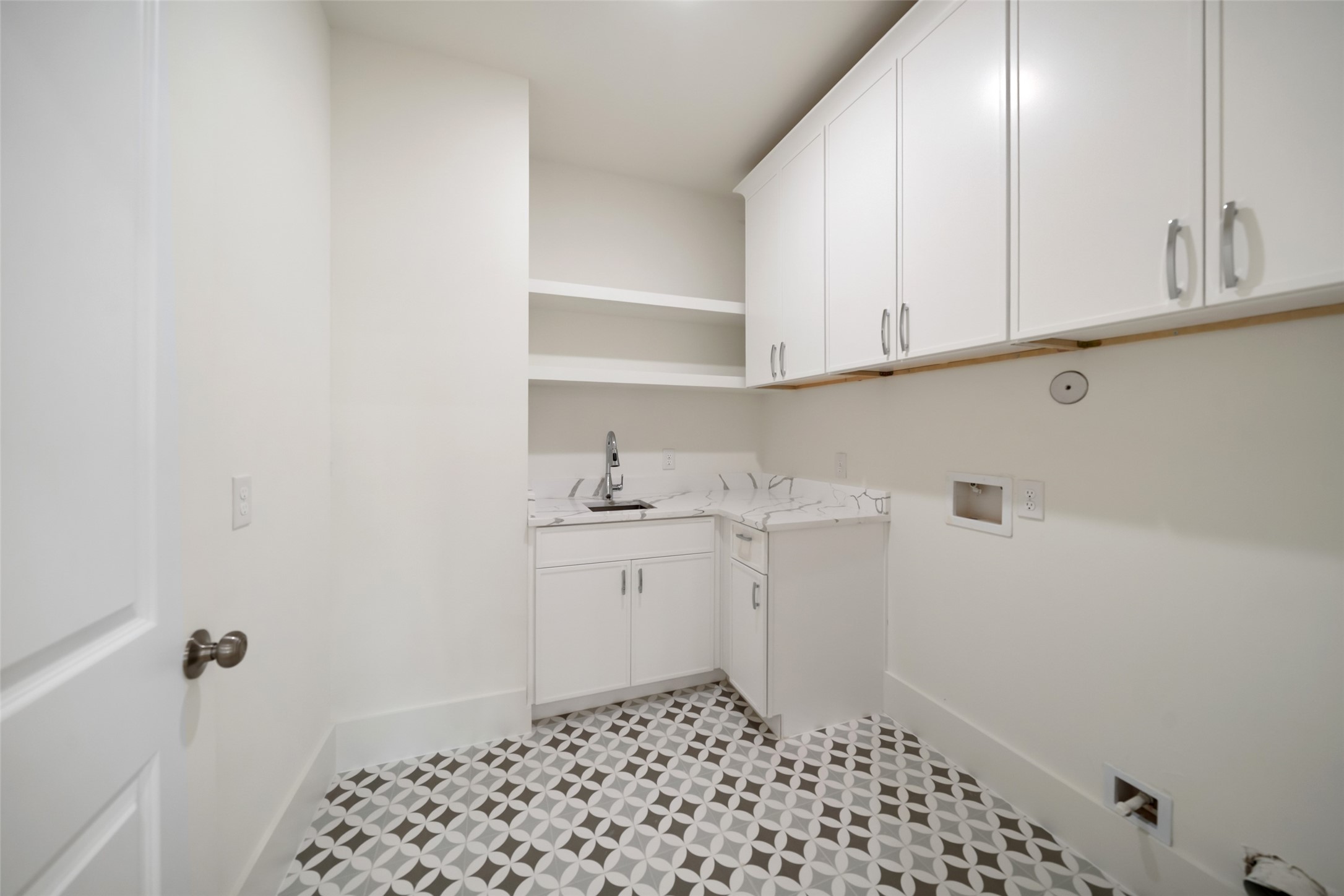 8521 Friendship Road Houston, TX 77080 - Photo 45 of 49 a room with a sink and cabinets