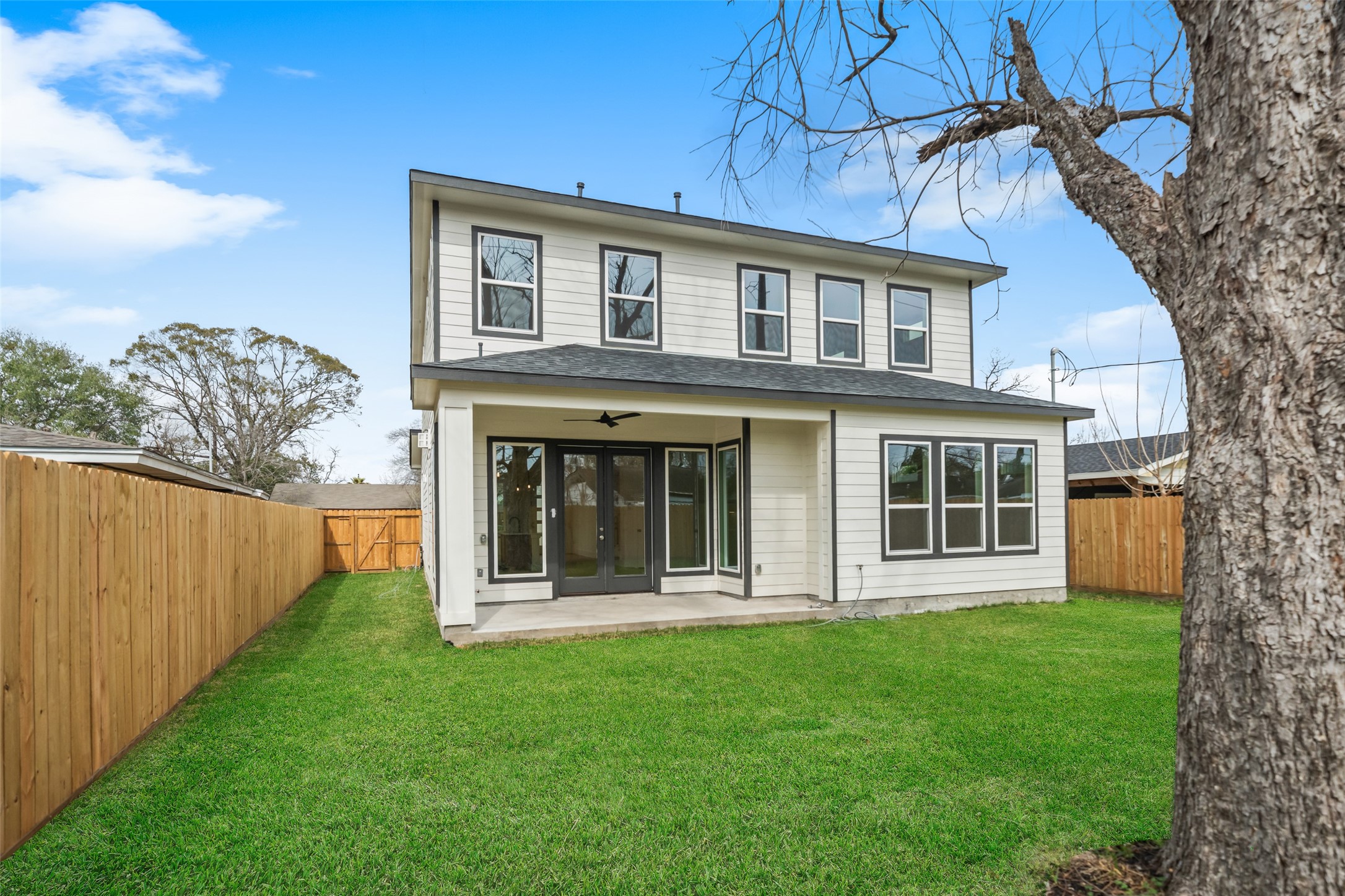 8521 Friendship Road Houston, TX 77080 - Photo 47 of 49 a view of a house with a yard and a large tree