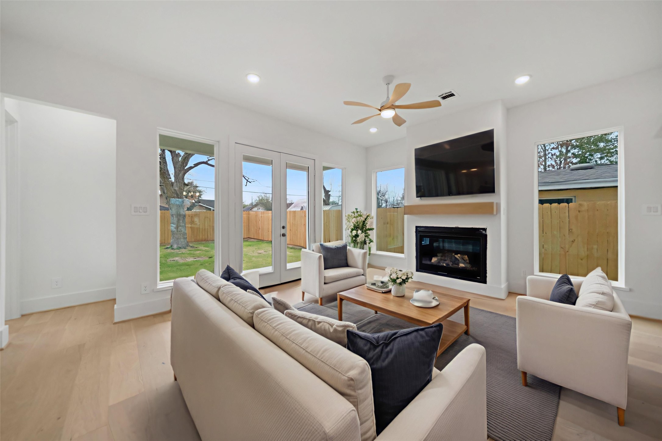 8521 Friendship Road Houston, TX 77080 - Photo 6 of 49 a living room with furniture and a fireplace