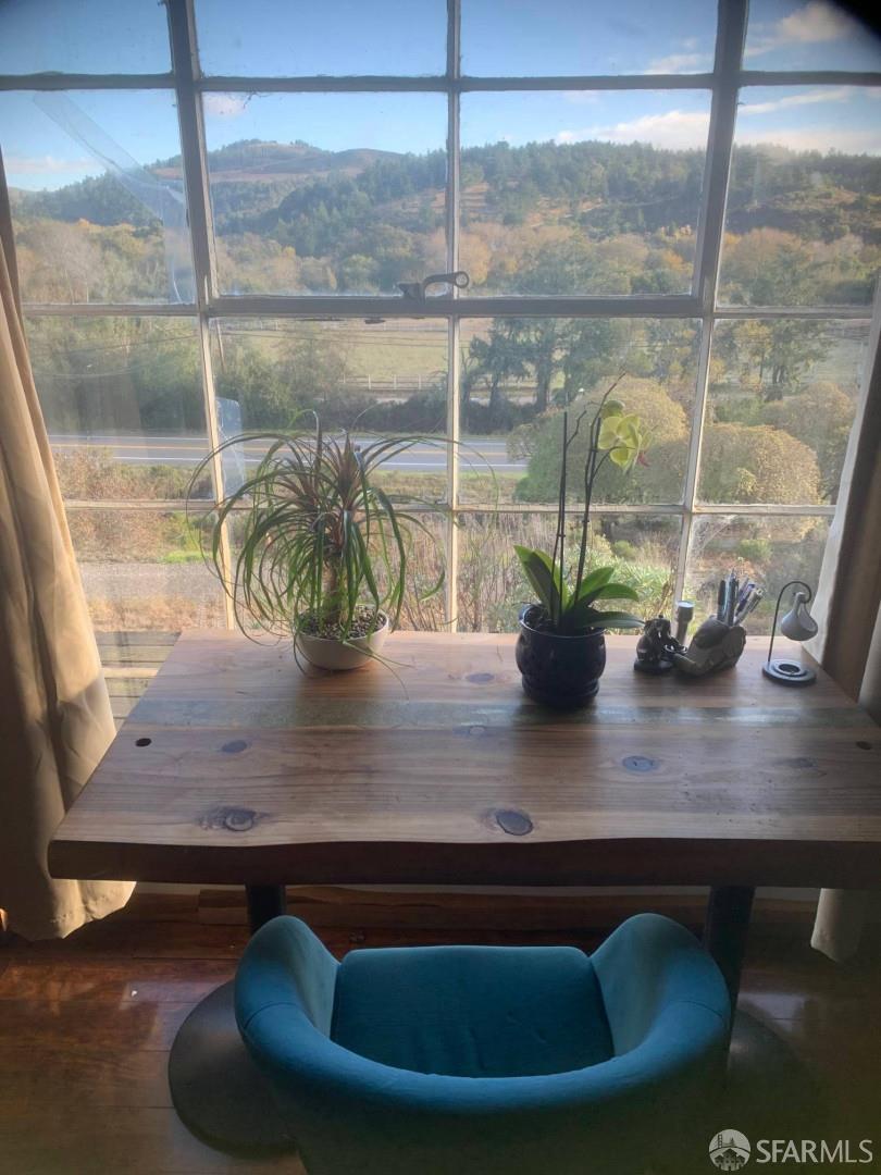 5631 Cloverdale Road Pescadero, CA 94060 - Photo 3 of 19 a view of a vase of flowers sitting on a table