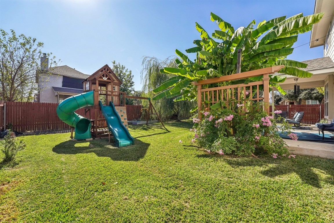 2301 Ambling Trail Pflugerville, TX 78660 - Photo 22 of 34 a view of a park with plants and a bench