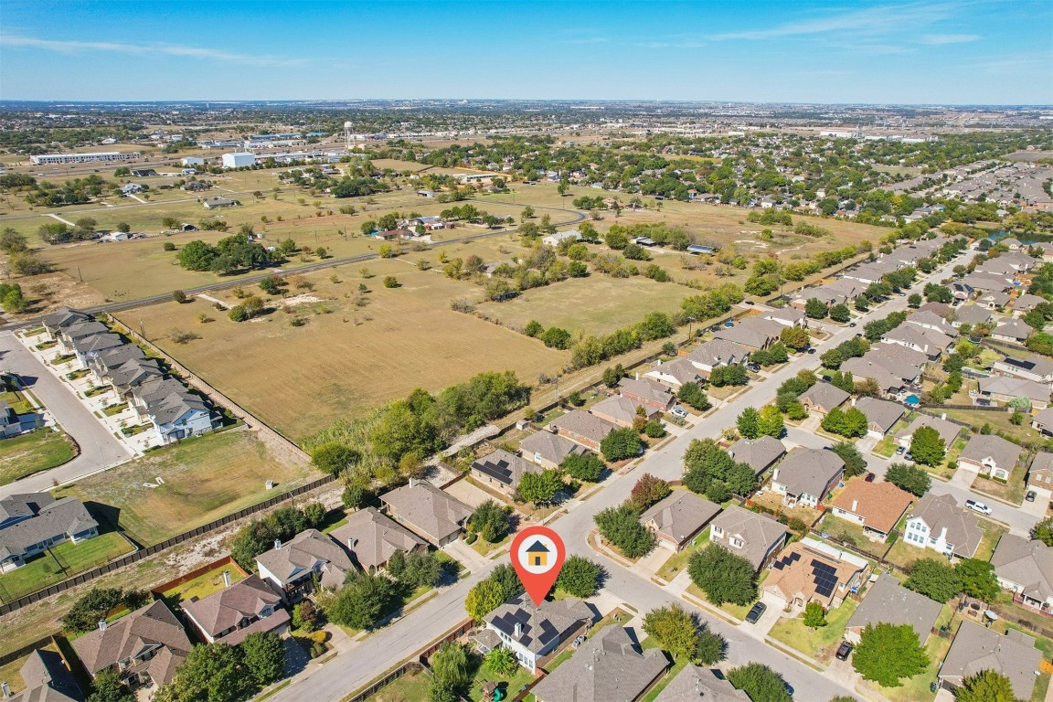 2301 Ambling Trail Pflugerville, TX 78660 - Photo 28 of 34 an aerial view of residential building and ocean