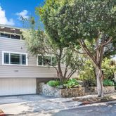 a house view with a outdoor space
