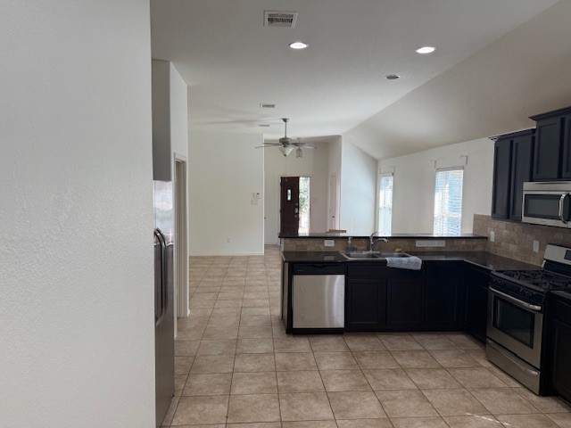 20719 Winghaven Drive Katy, TX 77449 - Photo 22 of 22 a large kitchen with granite countertop a sink and cabinets
