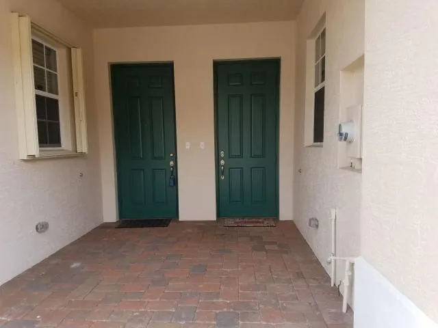 a front view of a house with garage