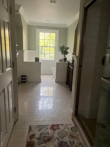 a view of kitchen with furniture and a window