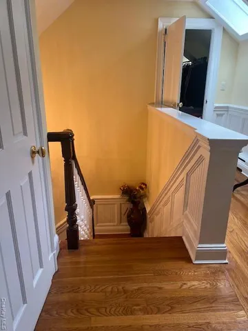 a view of entryway and kitchen