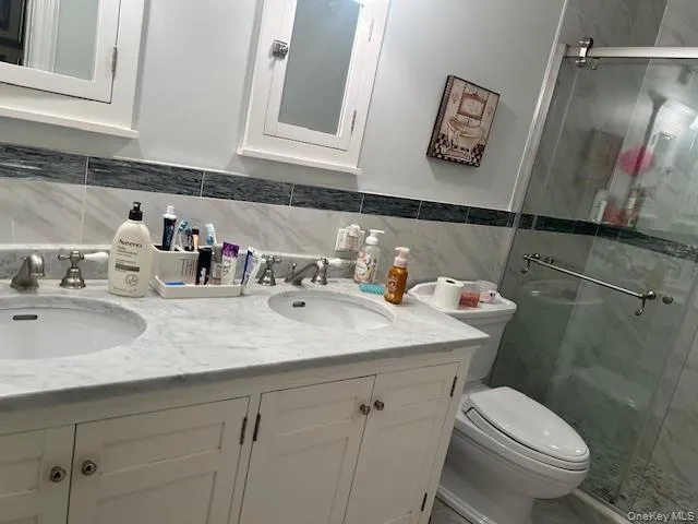 a bathroom with a sink and a toilet