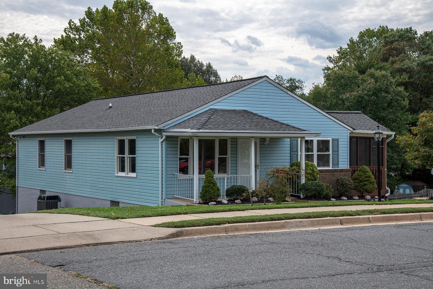 345 Edgewood Road Linthicum Heights, MD 21090 - Photo 2 of 63 a front view of a house with a yard