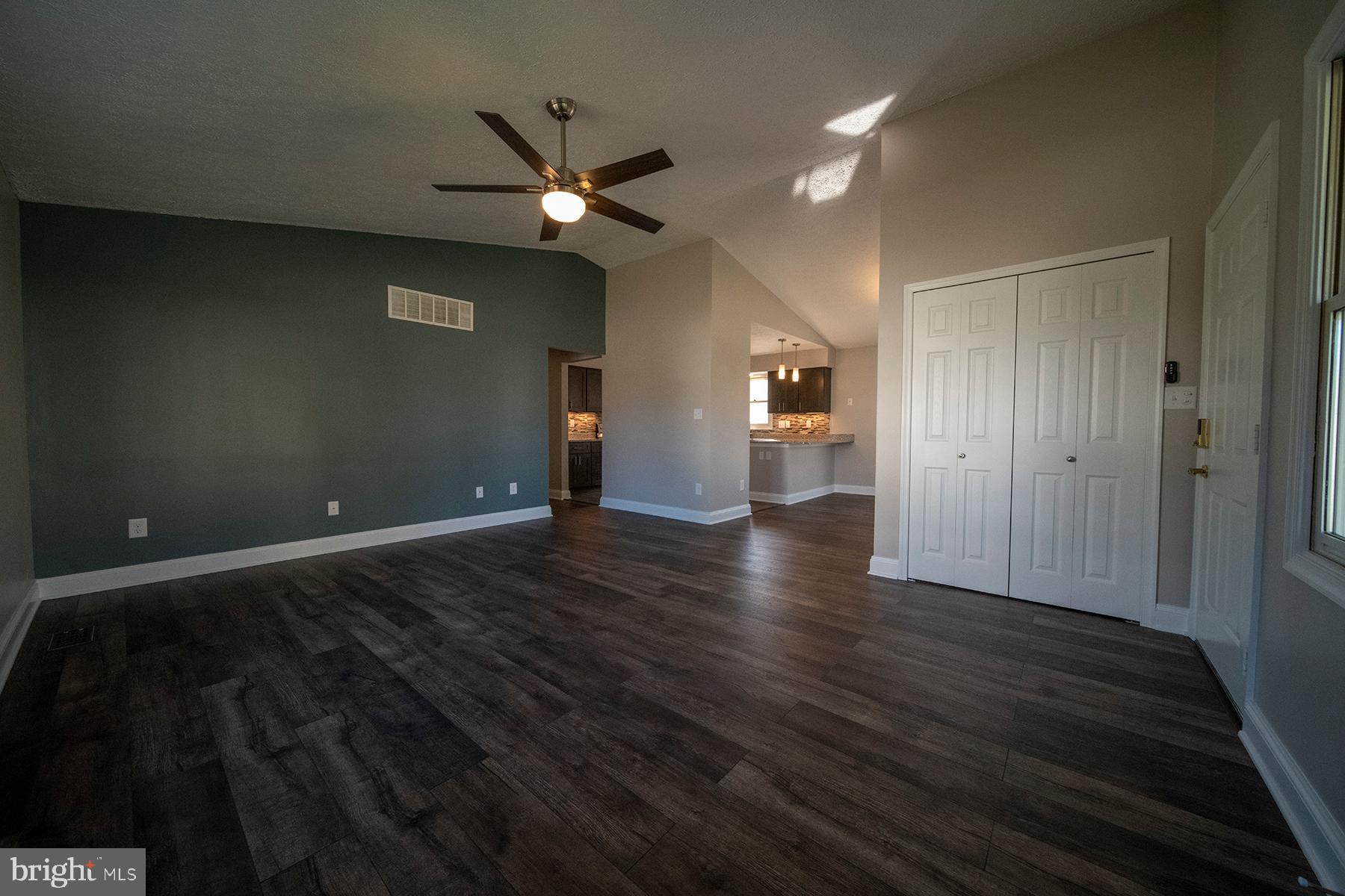 345 Edgewood Road Linthicum Heights, MD 21090 - Photo 15 of 63 wooden floor in an empty room with a window
