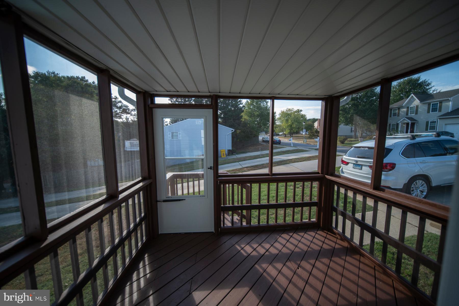 345 Edgewood Road Linthicum Heights, MD 21090 - Photo 21 of 63 a view of a porch with wooden floor and outdoor space