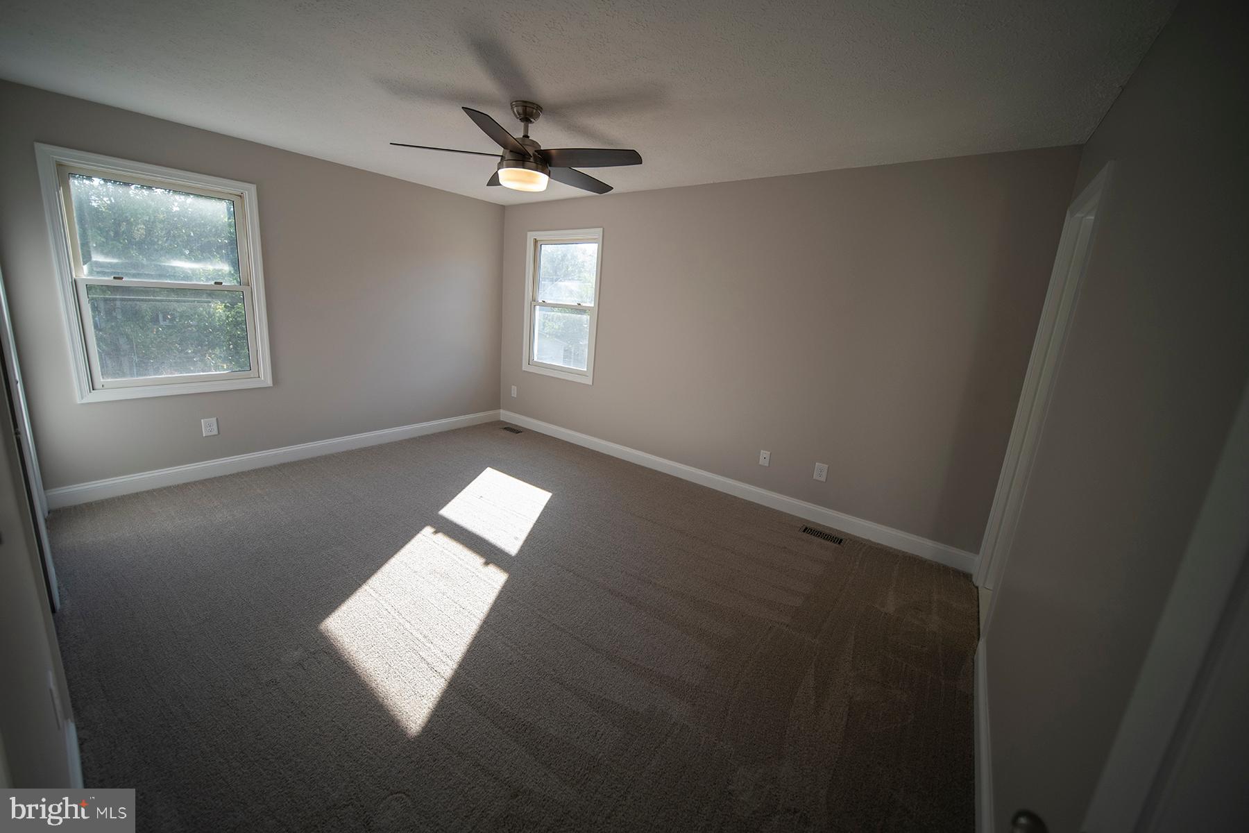 345 Edgewood Road Linthicum Heights, MD 21090 - Photo 36 of 63 an empty room with windows and closet
