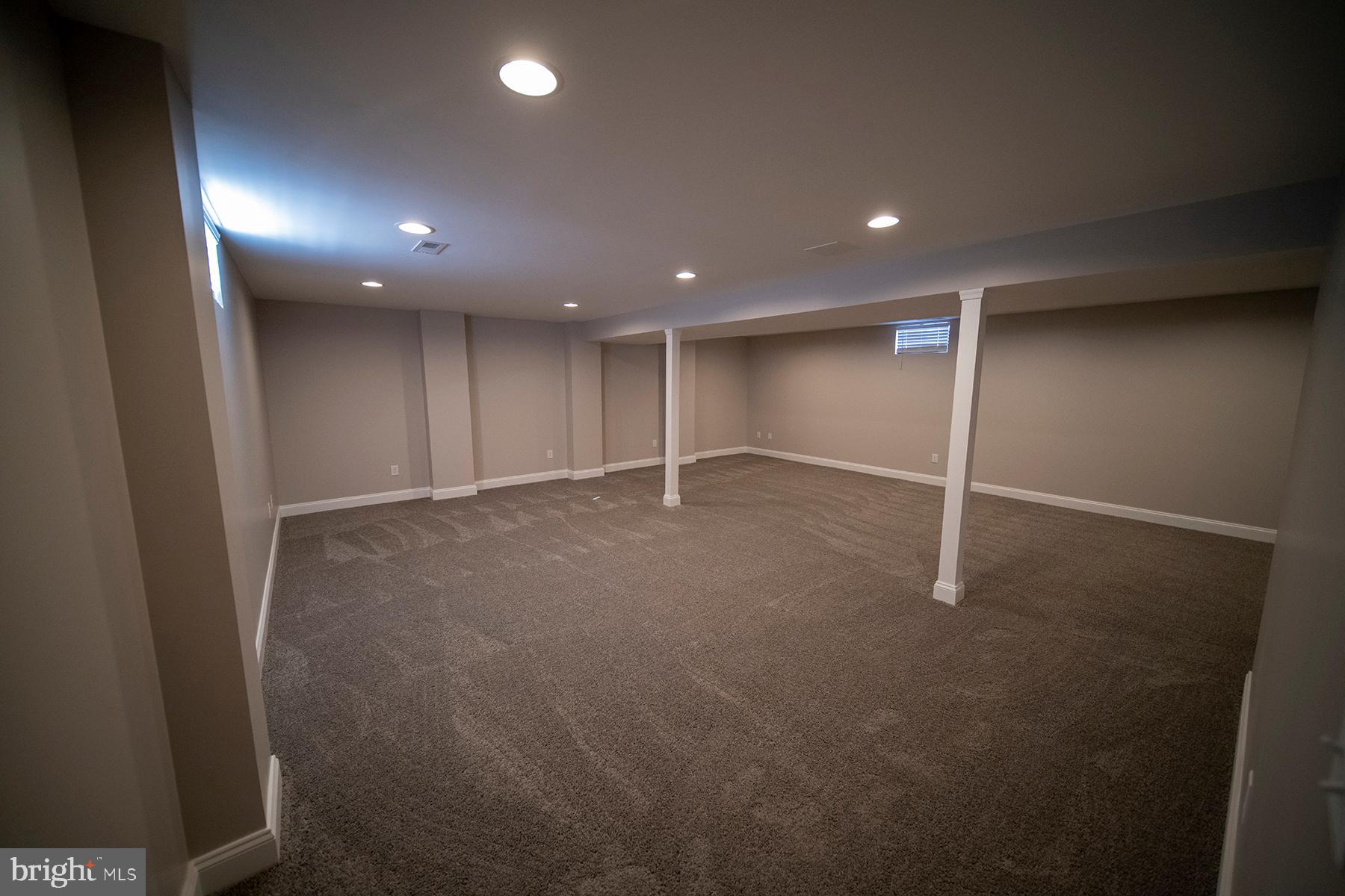 345 Edgewood Road Linthicum Heights, MD 21090 - Photo 46 of 63 an empty room with windows and pillars in it