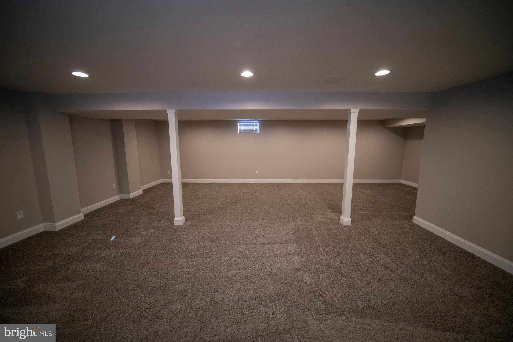 345 Edgewood Road Linthicum Heights, MD 21090 - Photo 47 of 63 an empty room with windows and pillars in it