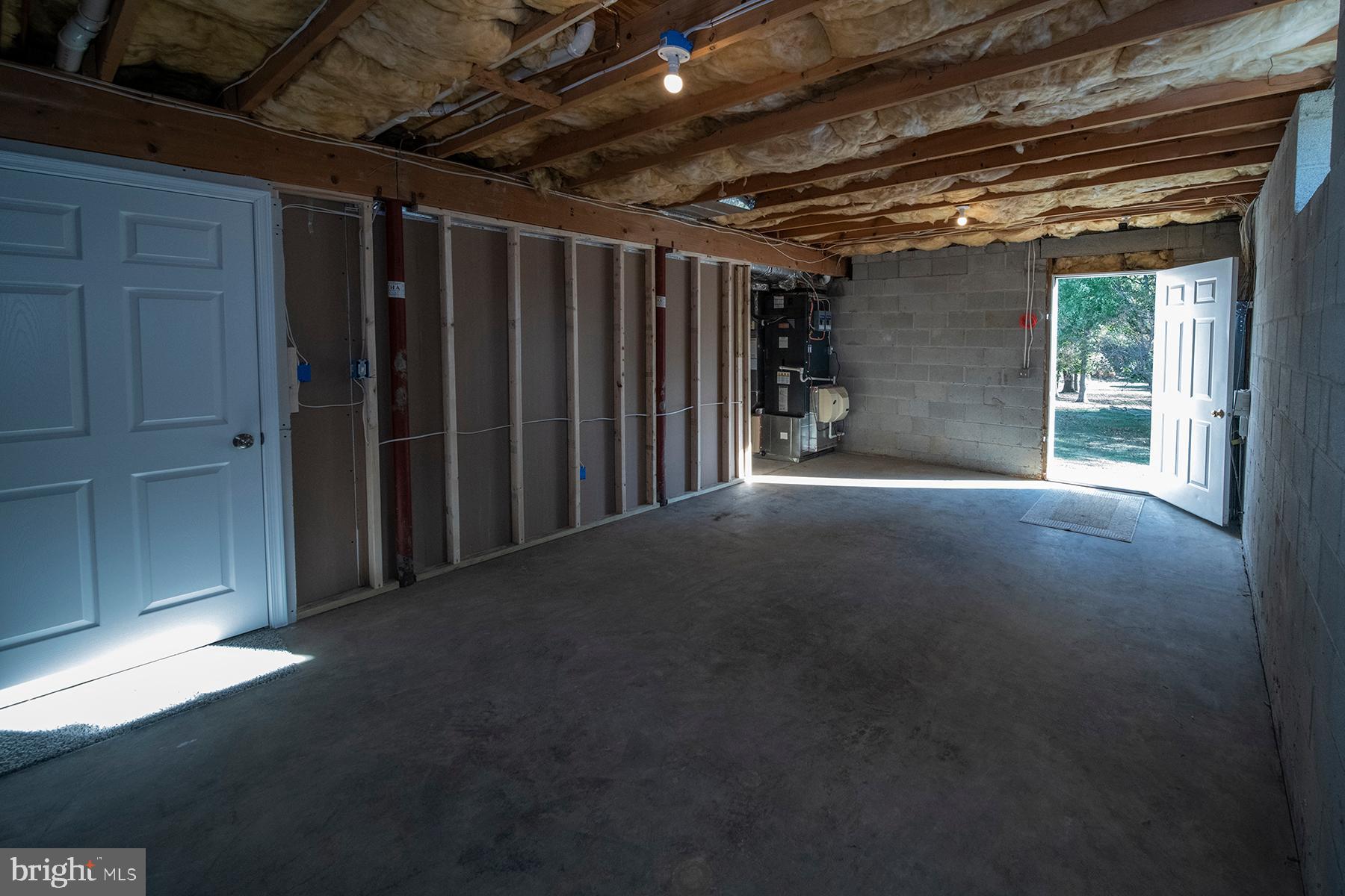 345 Edgewood Road Linthicum Heights, MD 21090 - Photo 61 of 63 a view of an empty room with a garage